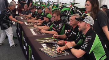 Jonathan Rea signing autographs with Tom Sykes, Eddie Lawson, Scott Russell, Eli Tomac, Austin Forkner and Jett Reynolds